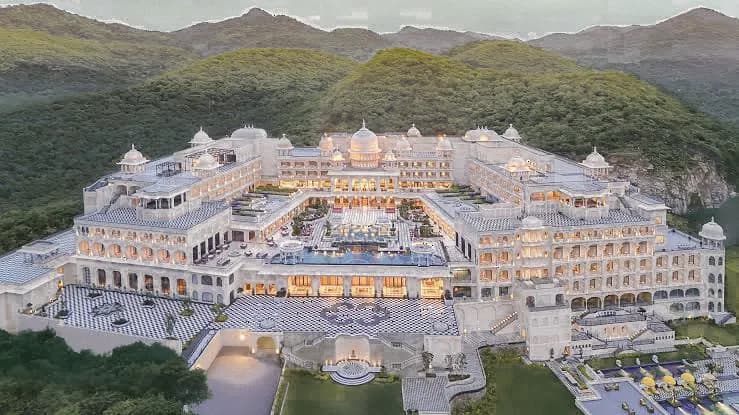 Palace hotel courtyard glowing at dusk