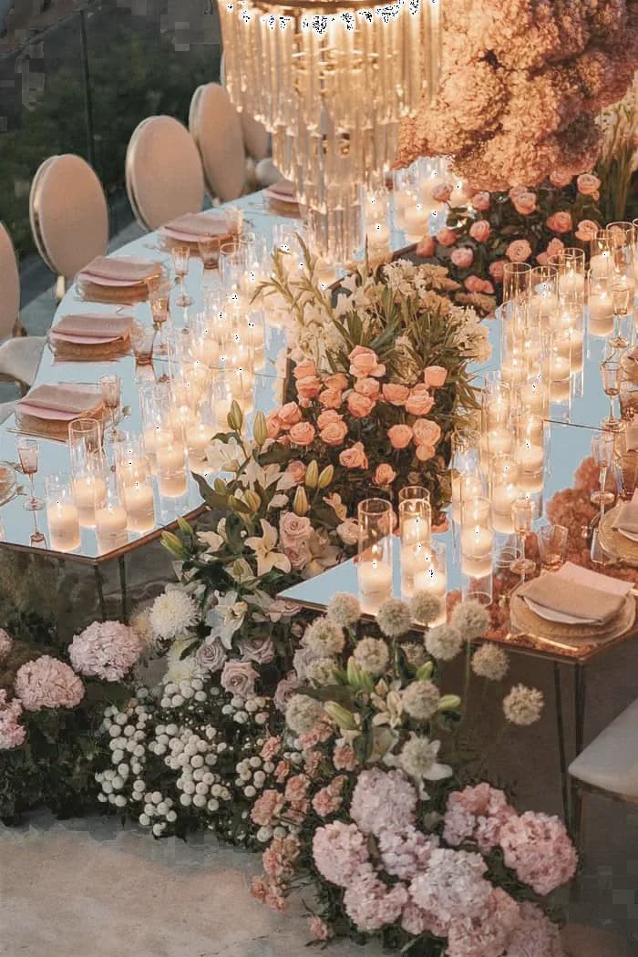 Candlelit reception table with flowers